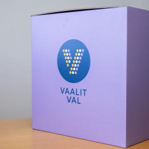 The purple ballot box has the word election written on it.
